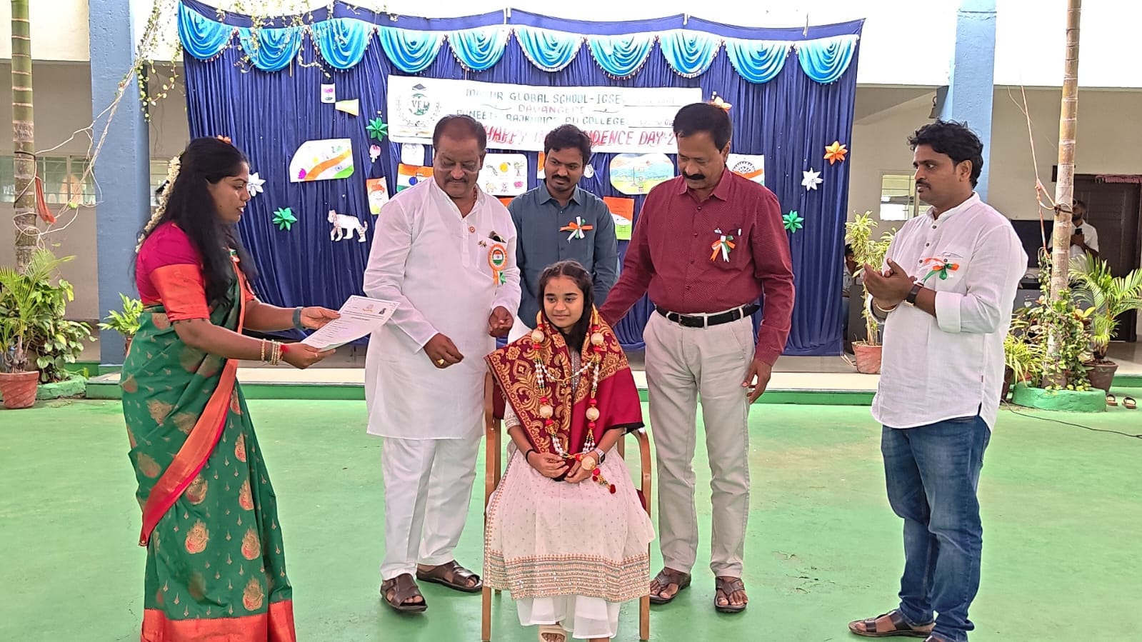 Student being felicitated during Independence Day