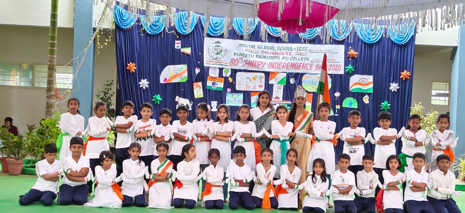 Students and teachers posing after a patriotic program