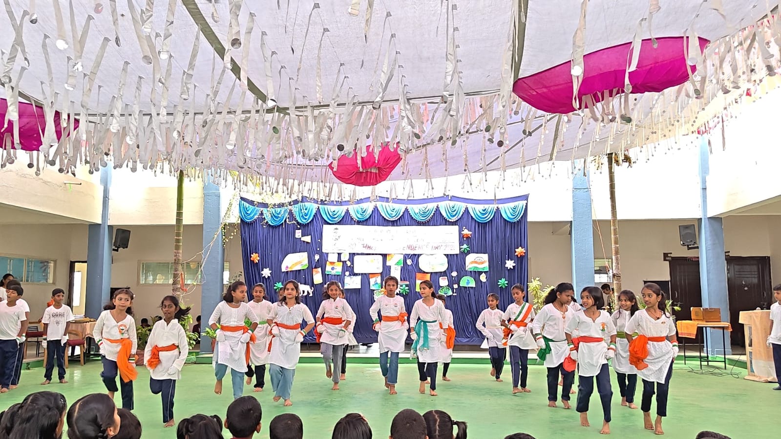 Children presenting a choreographed cultural performance